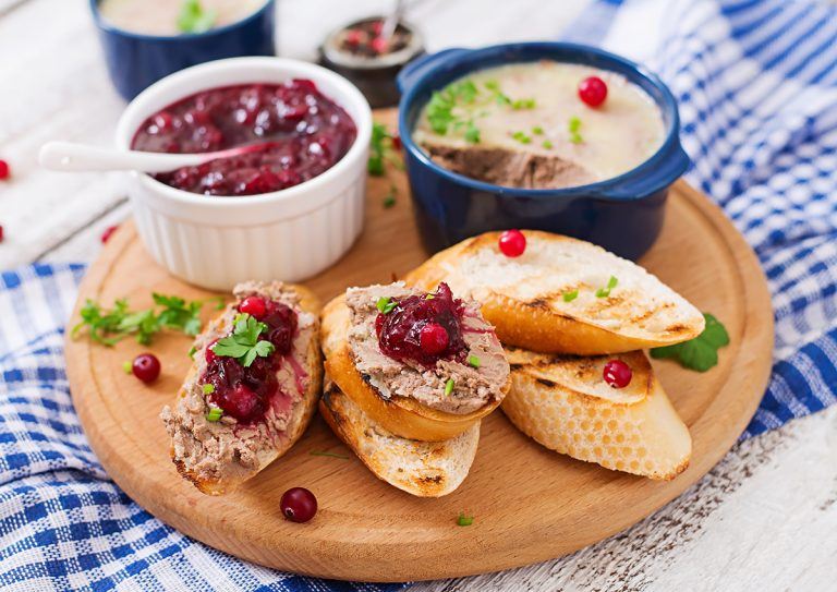 Chicken liver pate with cranberry sauce, served with croutons